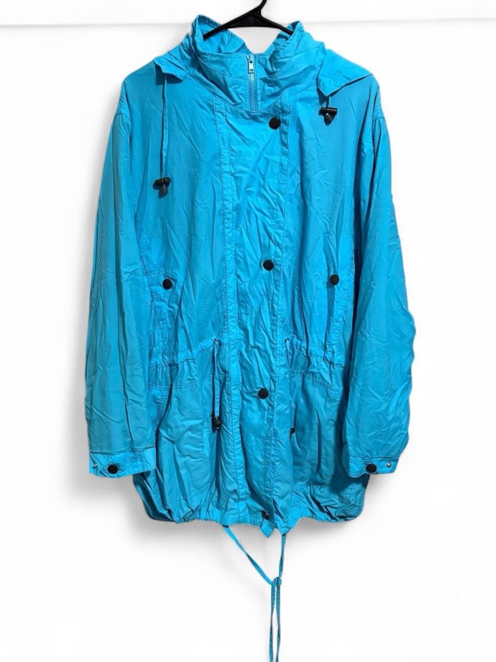 Woman Within vibrant blue rain jacket with detachable hood
